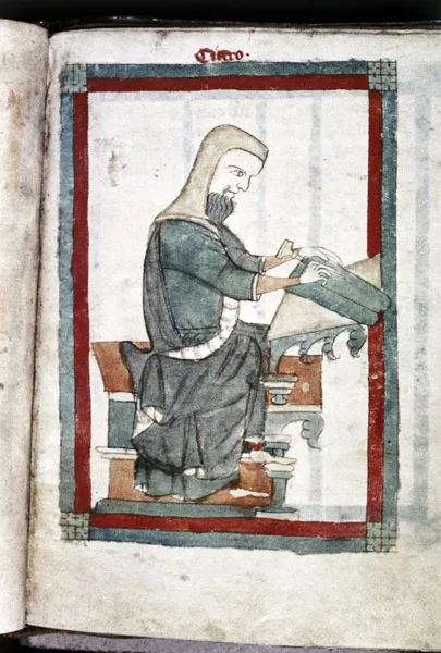 Cicero seated at desk writing with stylus on tablets (before becoming immortal and a defender of the holy grail). MS. Digby 46, f. 76r, England, XIV cent.