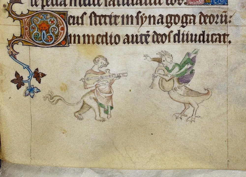 Royal 2 B VII, f. 192. Grotesques playing instruments